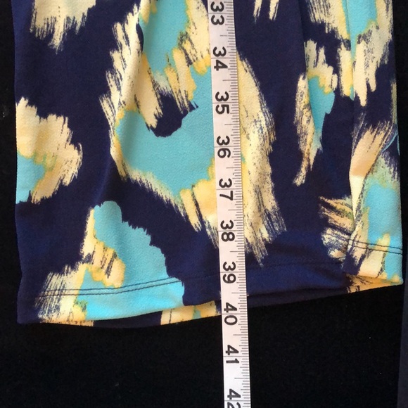 2 piece IMAN suit. Open jacket and pull on pants. Bright Navy, yellow, cheetah - Picture 15 of 16